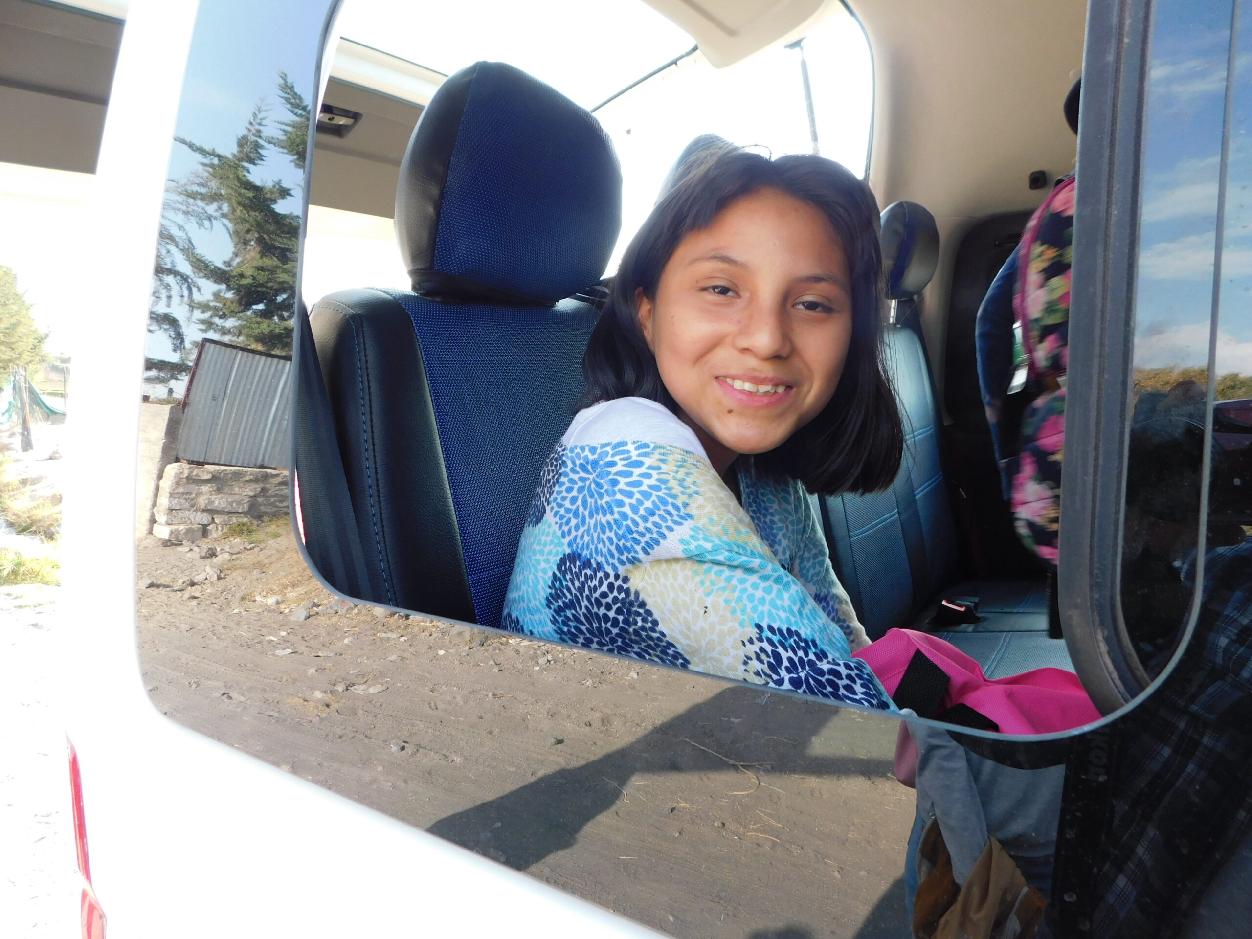 Girl smiling on an outing from Restoring Children International